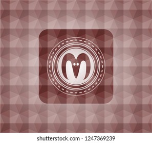 goat head icon inside red seamless emblem with geometric pattern background.