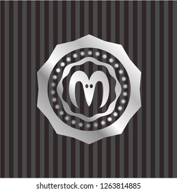goat head icon inside silver badge or emblem