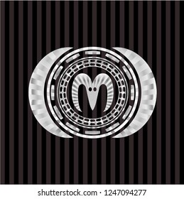 goat head icon inside silvery shiny badge