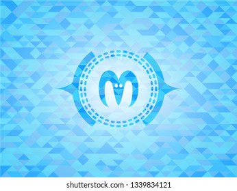goat head icon inside sky blue emblem with mosaic ecological style background