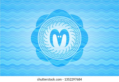 goat head icon inside water wave emblem background.
