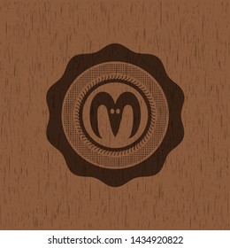 goat head icon inside wood emblem