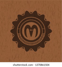 goat head icon inside wooden emblem. Retro