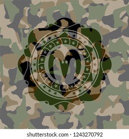 goat head icon on camo texture