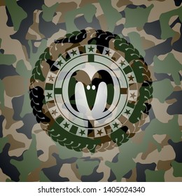 goat head icon on camo pattern