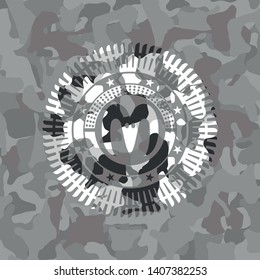 goat head icon on grey camouflaged pattern