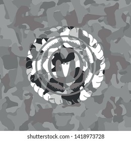 goat head icon on grey camo texture