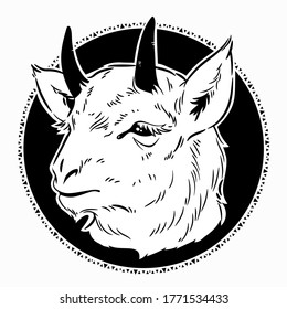goat head in a round frame