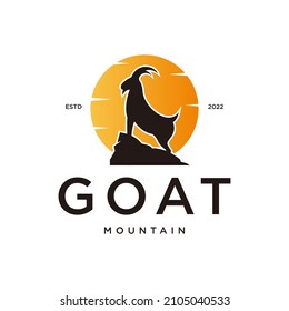 goat logo with sun and mountain design vector template