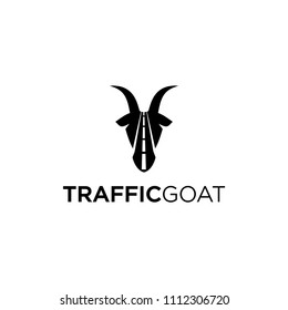 Goat with the negative space of the road 
