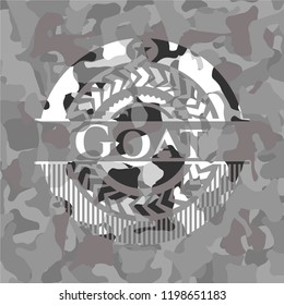 Goat written on a grey camouflage texture