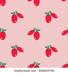 Goji berry with green leaves on light pink background. It is set as a seamless pattern and can be used for fabric, background, print, wallpaper, wrap paper, curtain, tile and etc.