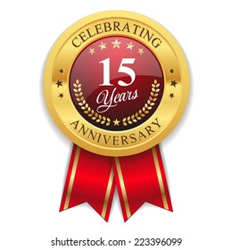 Gold 15 years anniversary badge with red ribbon on white background