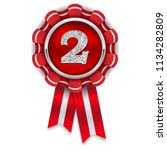 Gold 2nd place rosette, badge with red ribbon on white background