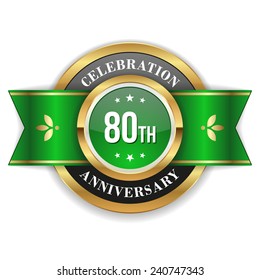 Gold 80th anniversary badge with green ribbon on white background