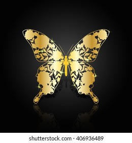 Gold abstract butterfly with floral pattern on black background.