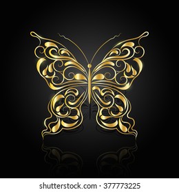 Gold abstract butterfly with reflection on black background.
