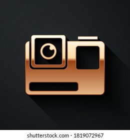 Gold Action extreme camera icon isolated on black background. Video camera equipment for filming extreme sports. Long shadow style. Vector Illustration