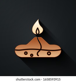 Gold Alcohol or spirit burner icon isolated on black background. Chemical equipment. Long shadow style. Vector Illustration