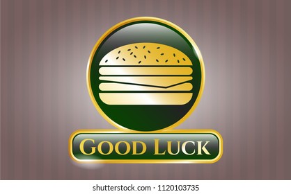  Gold badge with cheeseburger icon and Good Luck text inside