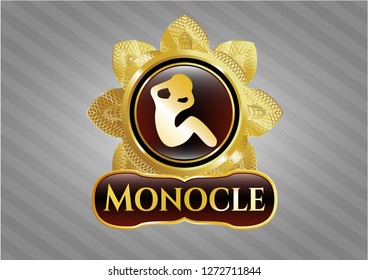  Gold badge with crunch icon and Monocle text inside