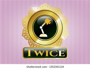  Gold badge with desk lamp icon and Twice text inside