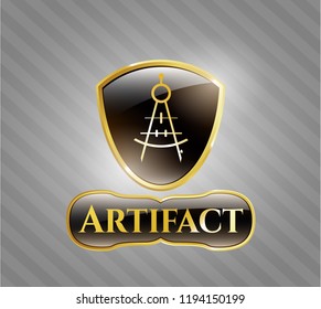  Gold badge with drawing compass icon and Artifact text inside
