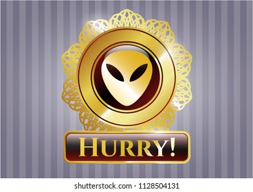  Gold badge or emblem with alien icon and Hurry! text inside