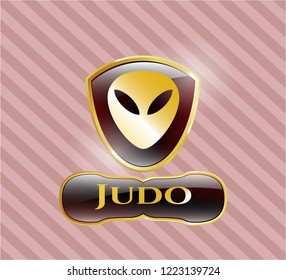  Gold badge or emblem with alien icon and Judo text inside