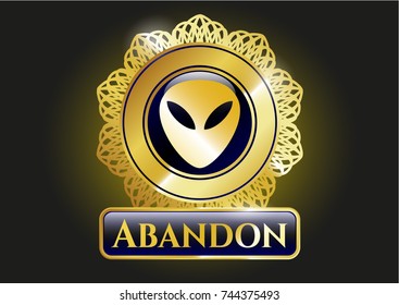  Gold badge or emblem with alien icon and Abandon text inside