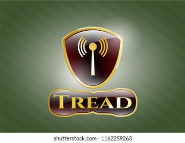  Gold badge or emblem with antenna signal icon and Tread text inside