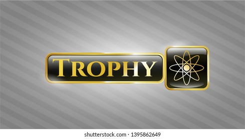  Gold badge or emblem with atom icon and Trophy text inside