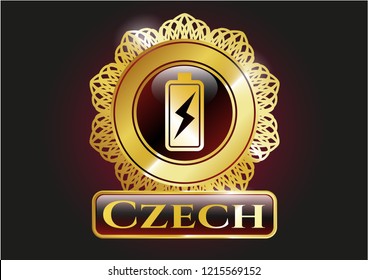 Gold badge or emblem with battery charging icon and Czech text inside