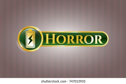  Gold badge or emblem with battery charging icon and Horror text inside