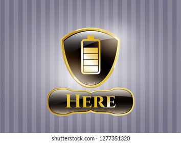  Gold badge or emblem with battery icon and Here text inside