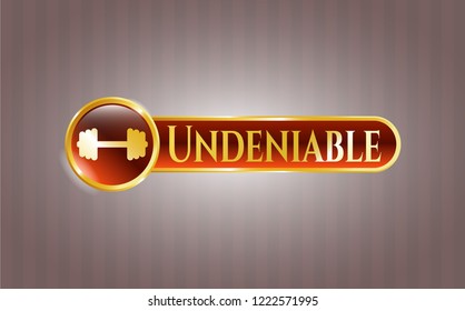  Gold badge or emblem with big dumbbell icon and Undeniable text inside