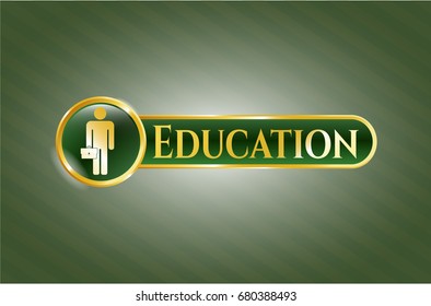  Gold badge or emblem with Businessman holding briefcase icon and Education text inside