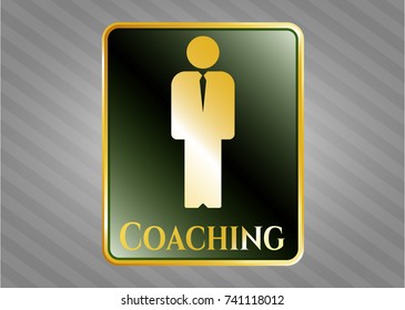  Gold badge or emblem with businessman icon and Coaching text inside