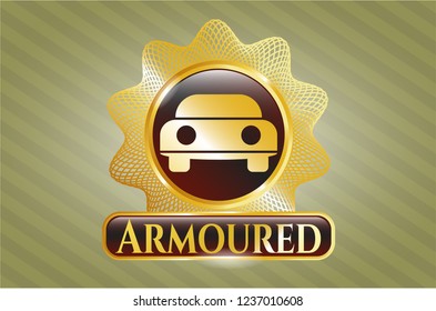  Gold badge or emblem with car seen from front icon and Armoured text inside