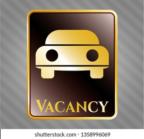  Gold badge or emblem with car seen from front icon and Vacancy text inside