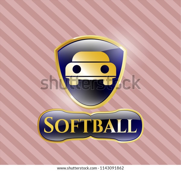  Gold badge or emblem with car seen from\
front icon and Softball text\
inside