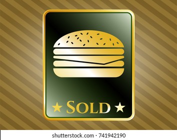  Gold badge or emblem with cheeseburger icon and Sold text inside