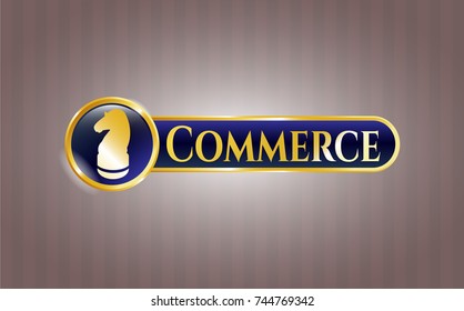  Gold badge or emblem with chess knight icon and Commerce text inside