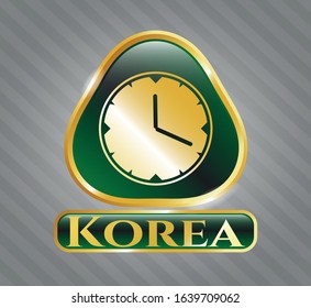  Gold badge or emblem with clock, time icon and Korea text inside