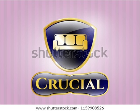  Gold badge or emblem with couch icon and Crucial text inside