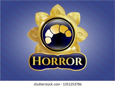  Gold badge or emblem with croissant icon and Horror text inside