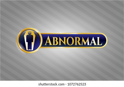   Gold badge or emblem with dead man in his coffin icon and Abnormal text inside