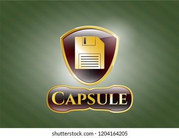  Gold badge or emblem with diskette icon and Capsule text inside
