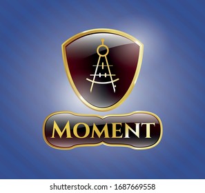  Gold badge or emblem with drawing compass icon and Moment text inside