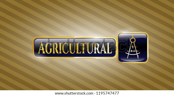  Gold badge or emblem with drawing compass\
icon and Agricultural text\
inside